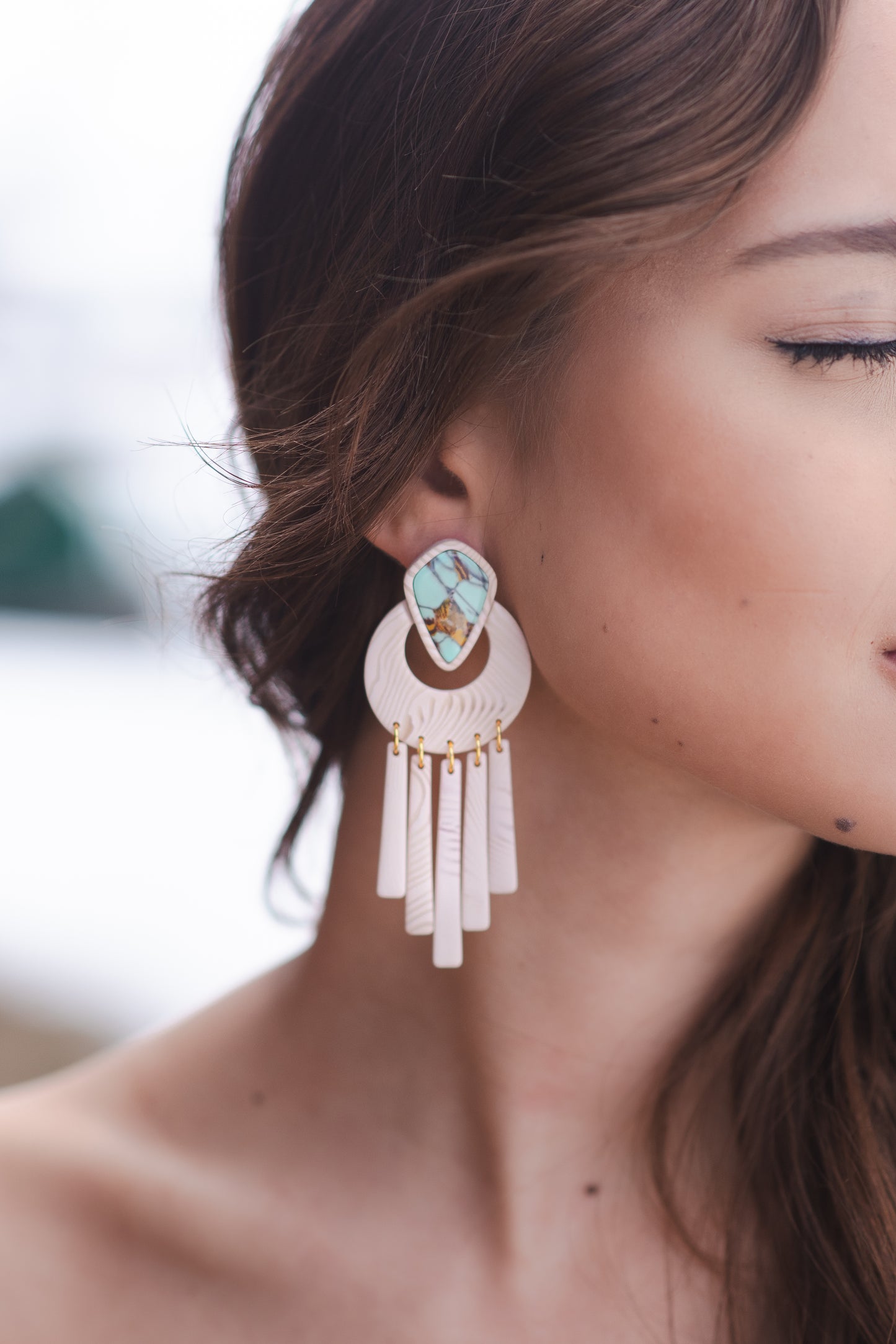 Polymer clay turquoise gem earrings.