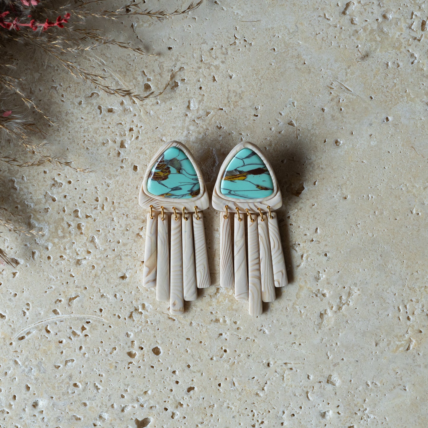 Green polymer clay earrings.