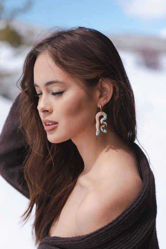 Turquoise and beige organic earrings.